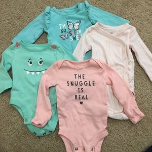 9 newborn long-sleeve onesies
